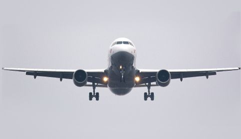 Front view of an airplane in flight